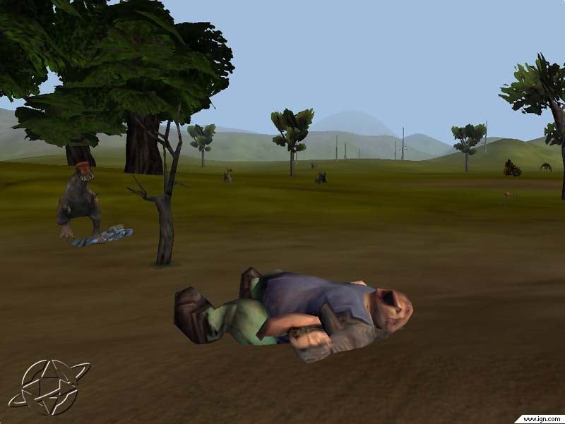 A defeated avatar lies on the ground in a grassy landscape, with a large creature in the background.