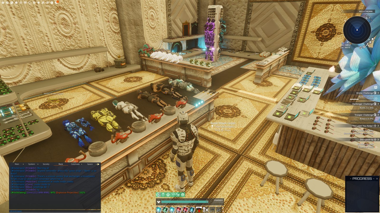A room displaying various gear and weapons on tables, with an avatar standing nearby. The walls are intricately designed, and the floor features a patterned carpet.